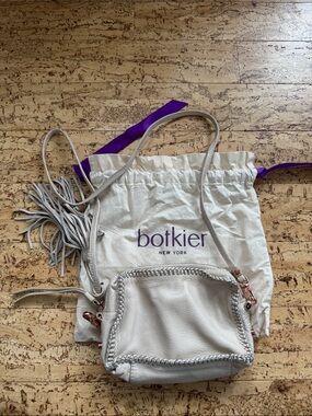 Botkier Cream Leather Crossbody with Braided Trim and Tassel